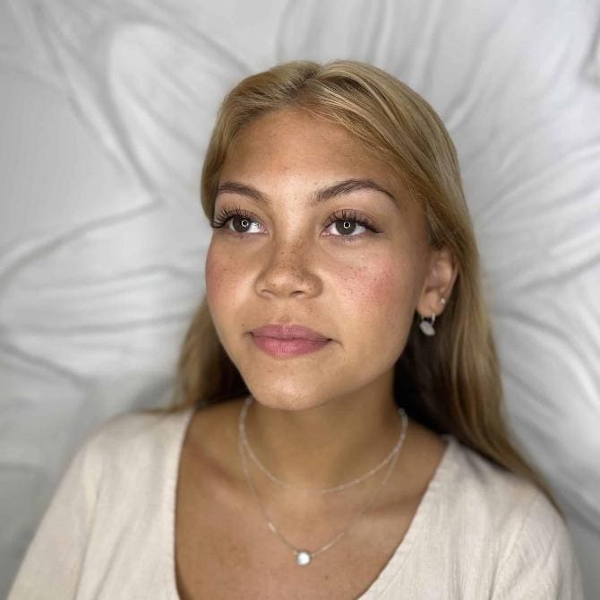 A woman with beautiful natural eyelashes.